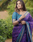 Rupali in our Purple Soft Silk Zari Woven Patola Saree with Contrast Weaves