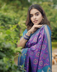 Rupali in our Purple Soft Silk Zari Woven Patola Saree with Contrast Weaves