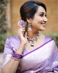 Divya in our Lavender Banarasi Jaal Satin Silk Pink Zari Woven Saree