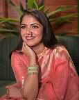 Aditi in our Dark Pink Organza Paithani Zari Woven Saree