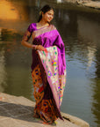 Saloni in our Purple Paithani Silk Saree with Half Half Concept Big Border Zari Woven Saree