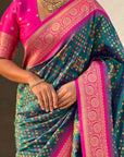 Green Soft Silk Zari Woven Premium Patola Saree with Contrast Weaves