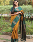 Rashmi in our Gold Soft Silk Floral Border Contrast Zari Woven Saree