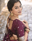 Kajal in our Wine Banarasi Soft Silk Silver Zari Woven Saree