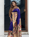 Sakshi in our Violet Paithani Silk Saree with Half Half Concept Big Border Zari Woven Saree
