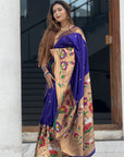 Sakshi in our Violet Paithani Silk Saree with Half Half Concept Big Border Zari Woven Saree