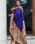Sakshi in our Violet Paithani Silk Saree with Half Half Concept Big Border Zari Woven Saree