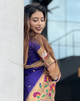 Sakshi in our Violet Paithani Silk Saree with Half Half Concept Big Border Zari Woven Saree