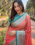 Coral Pink Kanchipuram Tissue Silk Traditional Zari Woven Saree