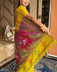 Yellow Soft Silk Ikkat Patola Saree with Meenakari Motifs Peacock Pallu and Gold Zari Border