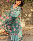 Monika in our Sea Green Chanderi Cotton Pichwai Printed Saree with Zari Woven Border