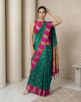 PGreen Soft Silk Paithani Saree Meenakari Peacock Motifs Zari Woven Swan Pallu Saree With Brocade Blouse