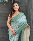 Sky Blue Assam Silk Floral Printed Saree with Zari Woven Border