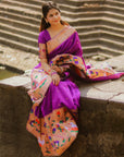 Saloni in our Purple Paithani Silk Saree with Half Half Concept Big Border Zari Woven Saree