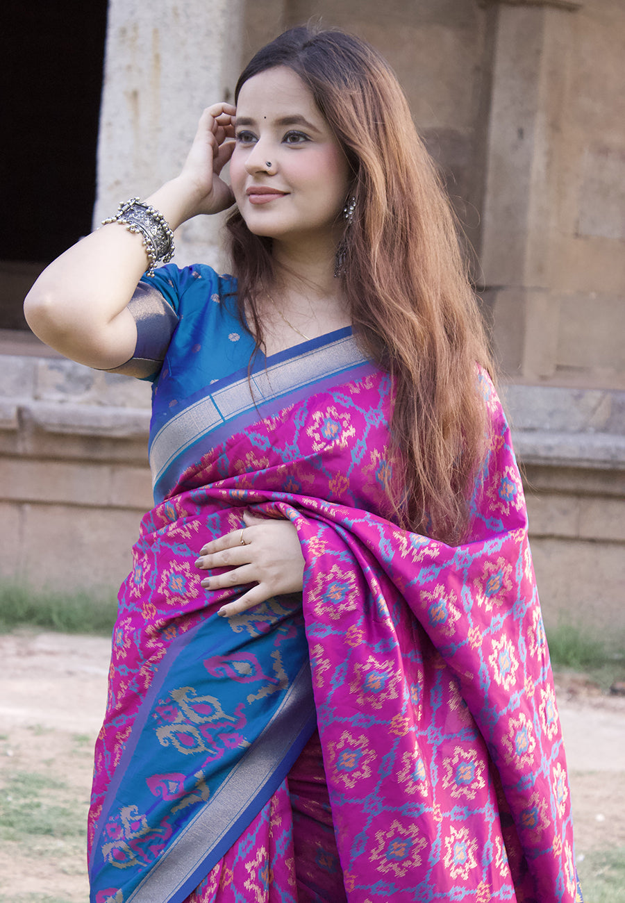 Himanshi in our Wine Soft Silk Zari Woven Patola Saree with Contrast Weaves