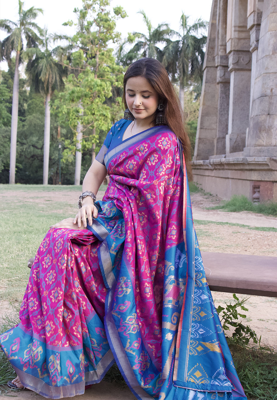 Himanshi in our Wine Soft Silk Zari Woven Patola Saree with Contrast Weaves