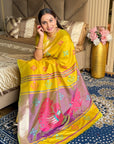 Yellow Soft Silk Ikkat Patola Saree with Meenakari Motifs Peacock Pallu and Gold Zari Border